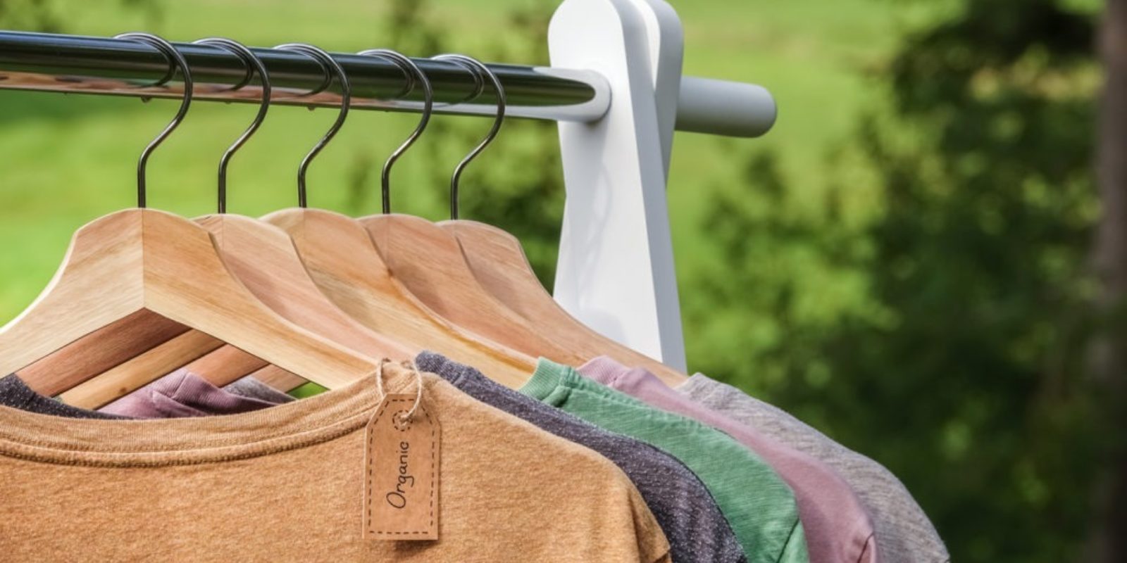 organic-hemp-clothing-shirts-hanging-on-rack-outside