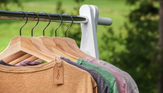organic-hemp-clothing-shirts-hanging-on-rack-outside
