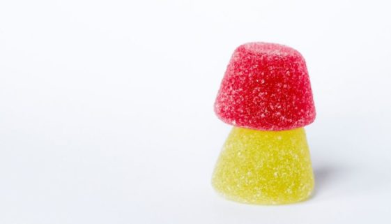 Red and yellow gummies stacked on top of each other.